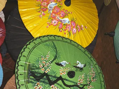 Green and yellow hand-painted paper umbrellas from Bo Sang, Chiang Mai