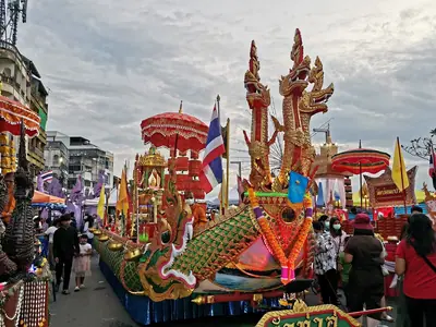 Chak Phra festival floats and a flag-lined street in Surat Thani (15 October 2022)