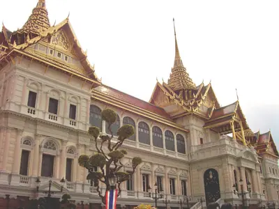 Front of the Chakri Maha Prasat Throne Hall with its Thai-style spires and Western facade