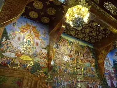 Painted and gilded ceiling inside the City Pillar shrine in Chiang Mai