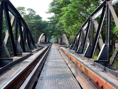 The railway track running across the iron bridge over the River Kwai