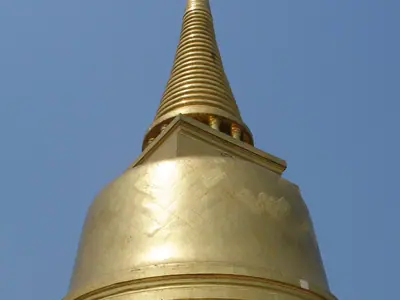 The golden stupa of Wat Saket (Golden Mount) against a blue sky