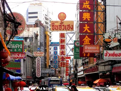 Yaowarat Road with a dense mass of Chinese signs and traffic