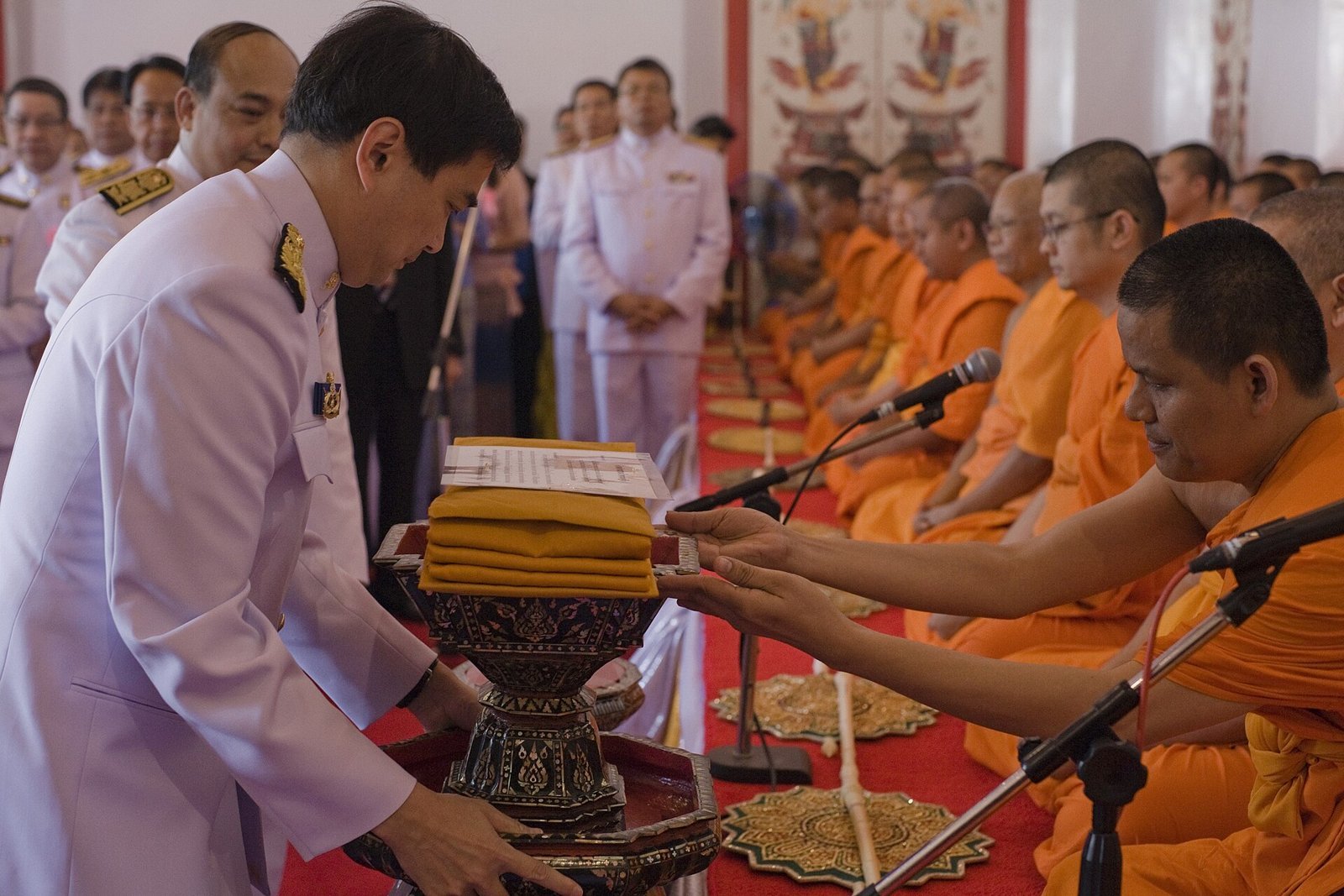 Offering kathina robes to monks during a Kathin ceremony (photo: Thai Government, CC BY 2.0, Wikimedia Commons)