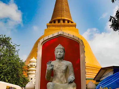 Standing Buddha in front of the chedi, Phra Pathom Chedi