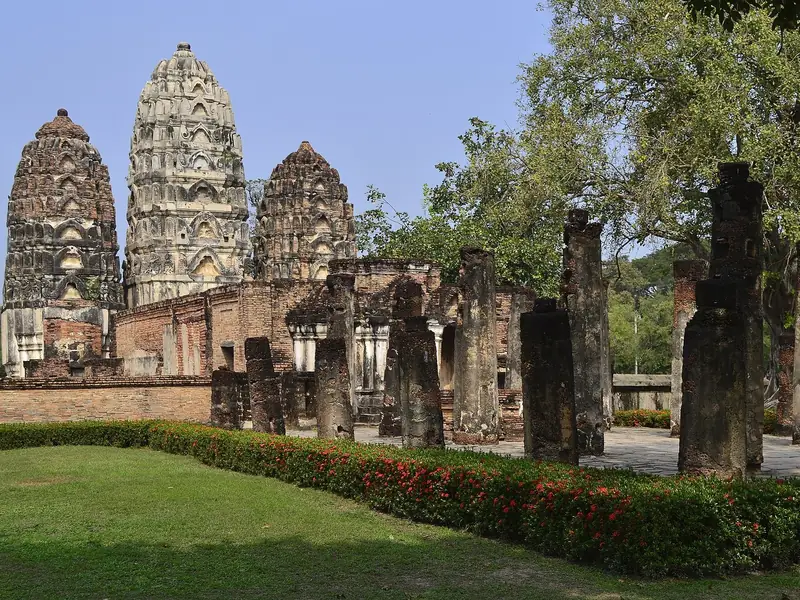 Three Khmer-style prangs behind the ruins, Wat Si Sawai (Sukhothai)