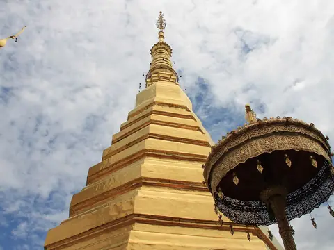 Golden chedi with a gilded parasol, Wat Phra That Cho Hae (Phrae)